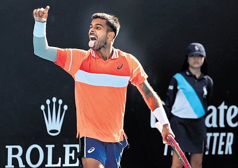 Sumit Nagal celebrates his win at the Australian Open on Tuesday, January 16, 2024.