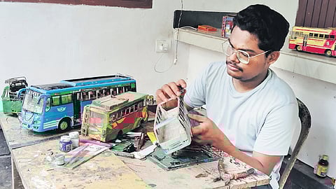 Akshay Suresh making miniature models of private buses