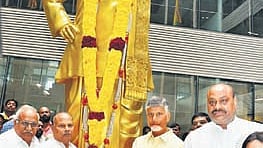 TDP chief N Chandrababu Naidu and other leaders pay floral tributes to the statue of NTR on Thursday.