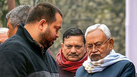 Bihar Chief Minister Nitish Kumar with former Dy Chief Minister Tejashwi Yadav 