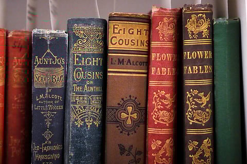 A selection of Louisa May Alcott books are archived at the American Antiquarian Society, a national research library of pre-20th century American history and culture, Tuesday, Jan. 9, 2024, in Worcester