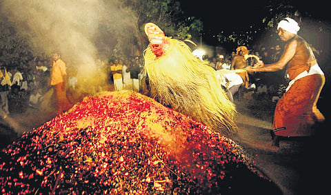 Theechamundi theyyam being performed at Kottakkunnu Kavu, Kannur | file pic