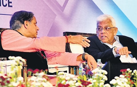 MP Shashi Tharoor and Deepak Parekh, chairman, HDFC Life Insurance Company, interacting at the KMA annual meet in Kochi.