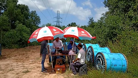 Engineers at work implementing Kerala Fiber Optic Network (KFON) project