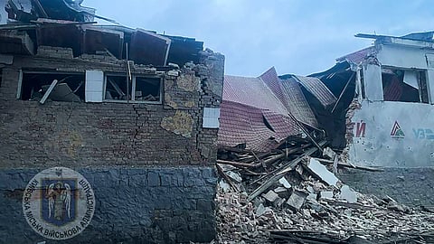 Debris of a destroyed apartment building is seen after a Russian attack in Kyiv, Ukraine, Tuesday, January 23, 2024.