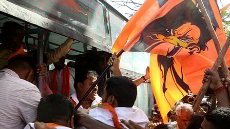 BJP leaders and supporters protest in Bengaluru on Monday against the lowering of Hanuman Dwaja at Mandya district.