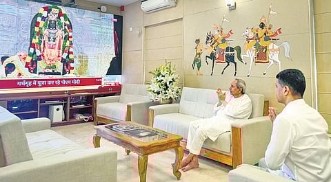 CM Naveen Patnaik and 5T chairman VK Pandian watch the live telecast of Ram Lalla Pran Pratishtha ceremony, at Naveen Nivas in Bhubaneswar, on Monday.
