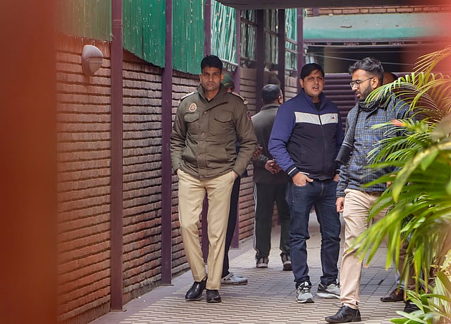 Enforcement Directorate (ED) officials at Jharkhand Chief Minister Hemant Soren's residence in connection with a money laundering case, in New Delhi, Monday, Jan. 29, 2024.