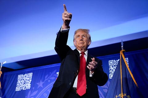 Republican presidential candidate former President Donald Trump gestures after speaking at a campaign event in Portsmouth, N.H., Wednesday, Jan. 17, 2024.
