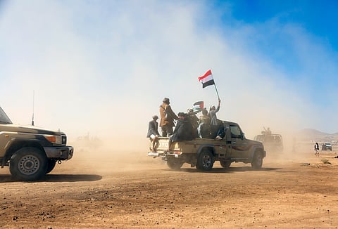 Houthi fighters and tribesmen stage a rally against the U.S. and the U.K. strikes on Houthi-run military sites near Sanaa, Yemen. 