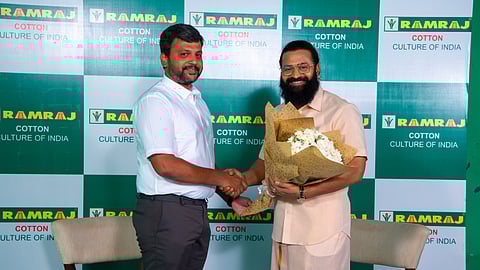 Ramraj Cotton MD Arun Eashwar with 'Kantara' movie actor Rishabh Shetty.