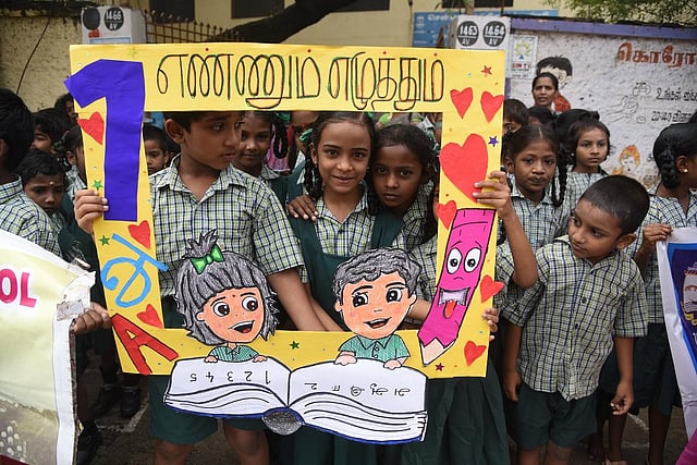 School children participated in an awareness drive to raise awareness on the basic literacy and numeracy scheme (Ennum Ezhuthum Mission) targeted at children under the age of eight, in Chennai, on Monday. (Photo |R.Satish Babu, EPS)