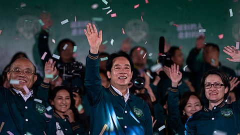 Taiwanese Vice President Lai Ching-te, also known as William Lai, left, celebrates his victory with running mate Bi-khim Hsiao in Taipei, Taiwan, Saturday, Jan. 13, 2024.