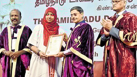 Governor RN Ravi confers degree to a student who secured gold medals, at the 36th convocation of TN Dr MGR Medical University, in Chennai on Saturday | P Jawahar