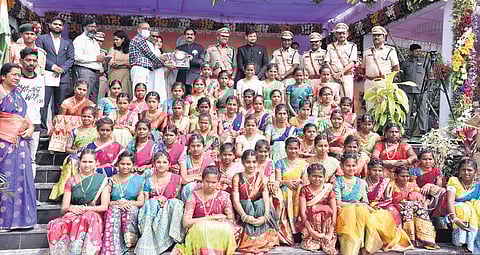 Guntur district collector Venugopal Reddy handing over awards during the 75th Republic Day celebrations.