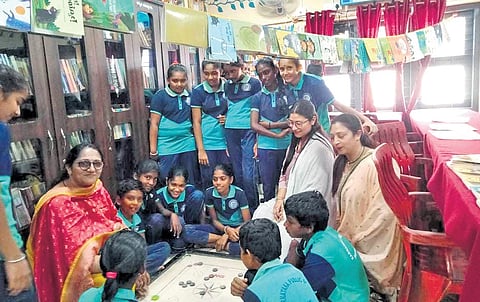 Elected representatives of Jammu and Kashmir Panchayat interacting with children in Ponnampet panchayat.