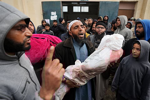 Israel vows to 'finish the job' in Gaza as War Cabinet member threatens a Ramadan deadline for Rafah