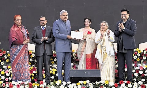 V-P Jagdeep Dhankhar felicitating a student at the college’s centenary celebrations