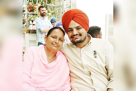 Late Punjabi singer Sidhu Moosewala with his mom, Charan Kaur.