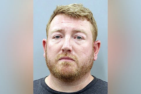 This booking photo provided by Houston Police Department shows Mason Herring, a 39-year-old Houston attorney, who pleaded guilty, Wednesday, Feb. 7, 2024, to injury to a child and assault of a pregnant person. 