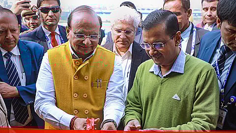 Delhi Lt Governor VK Saxena and Chief Minister Arvind Kejriwal during the flag off ceremony of 350 electric buses, in New Delhi, Wednesday.