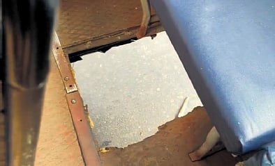 After commuters promptly raised an alarm, the bus was brought to a halt and the woman, who was hanging onto the floor, was rescued and given first aid