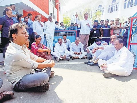 BRS MLAs stage a protest on the Assembly premises on Wednesday