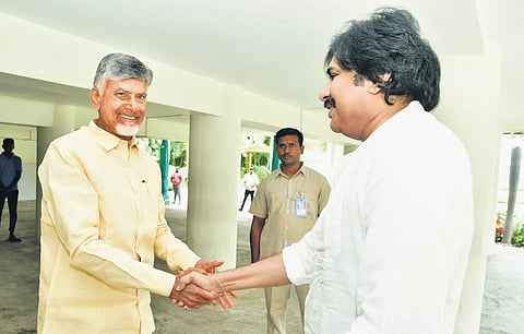 Jana Sena Party president Pawan Kalyan greeting TDP supremo N Chandrababu Naidu at the latter’s residence in Undavalli on Sunday.