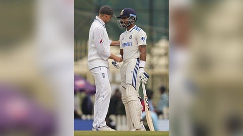 Dhruv Jurel (R) being congratulated by England's Joe Root on Day 3 of the fourth Test at Ranchi on Sunday