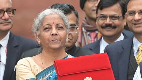 Union Finance Minister Nirmala Sitharaman seen holding a folder-case with Interim Budget 2024 outside the Finance Ministry, in New Delhi. 
