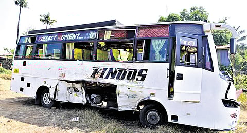 The damaged bus and lorry collided with each other at Perumbavoor on Monday.