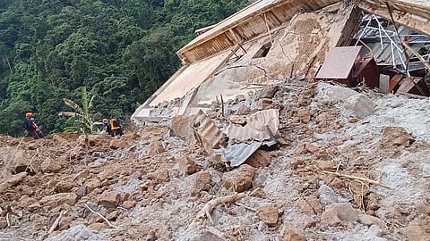 At least 28 people were killed and 32 injured when a rain-induced landslide engulfed two buses and 55 houses in a mountainous region of the southern Philippines, an official said on February 7.