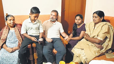 Wayanad MP Rahul Gandhi consoling the family members of Ajeesh Joseph at Chaligadha in Mananthavady on Sunday.