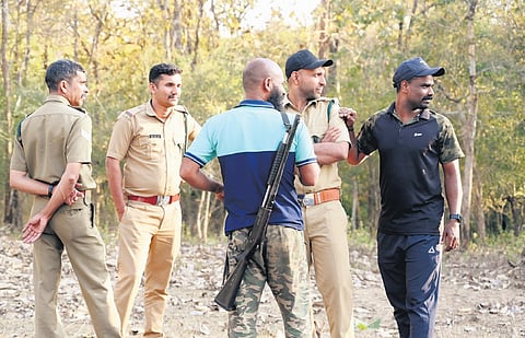 Forest officers patrolling the Bavali road near the Karnataka border.