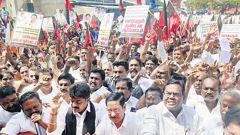 DMK functionaries staging a protest in Rameswaram against the arrest of fishermen by Sri Lanka and condemning the Centre for its inaction.