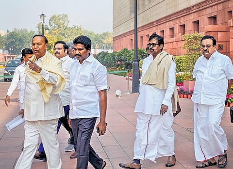 DMK MP TR Baalu and others after walking out of the Budget session of Parliament on Saturday 