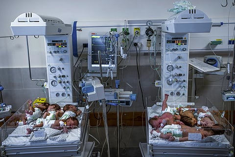 Premature babies are prepared for transport to Egypt after they were evacuated from Shifa Hospital in Gaza on Nov 20, 2023.