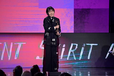 Celine Song accepts the award for best director for "Past Lives" during the Film Independent Spirit Awards on Sunday.