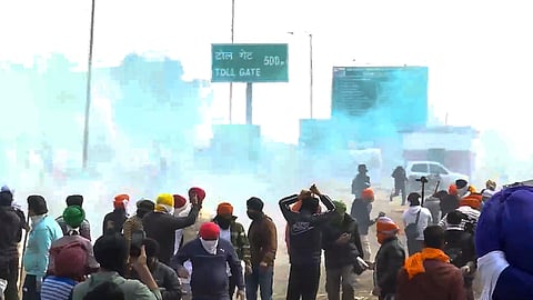 Teargas dropped on farmers at Shambhu border (Punjab-Haryana) during their 'Delhi Chalo' march, in Ambala, Tuesday, Feb. 13, 2024. 