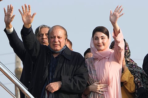 Pakistan's former Prime Minister Nawaz Sharif, center, and his daughter Maryam Nawaz