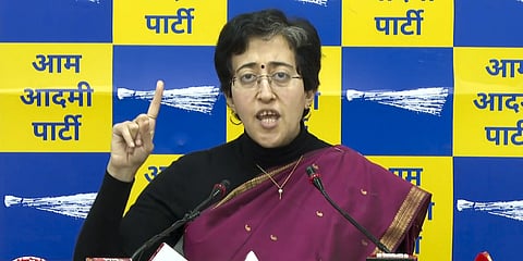 Delhi Minister Atishi addresses a press conference, in New Delhi.