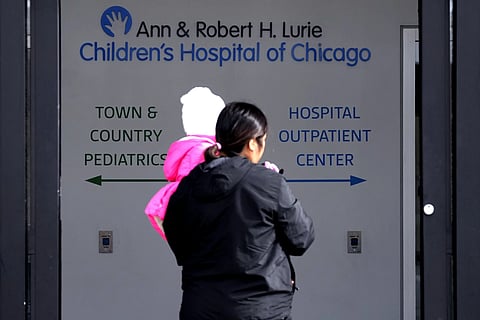 Lurie Children's Hospital sign is seen at the hospital as patients walk in, Feb 5, 2024, in Skokie, Ill.