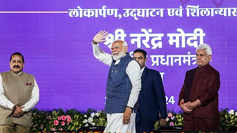 Prime Minister Narendra Modi with Union Minister Jitendra Singh and J&K Lt. Governor Manoj Sinha during the inauguration & foundation stone laying ceremony of multiple developmental projects, in Jammu.