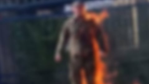 In the video shared on social media, the man is seen wearing military fatigues and declaring he will "not be complicit in genocide" before dousing himself in liquid.