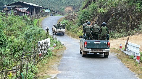 Members of the ethnic minority armed group Ta'ang National Liberation Army (TNLA) heading to the front line amid clashes with Myanmar's military near Namhsan Township in Myanmar's northern Shan State, December 13, 2023.