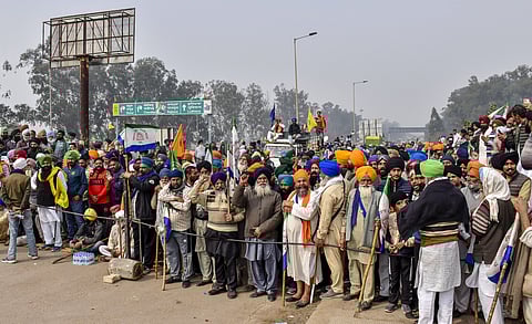 Farmers raising slogans at the Punjab-Haryana Shambhu border on Sunday during their ‘Delhi Chalo’ protest near Patiala district.