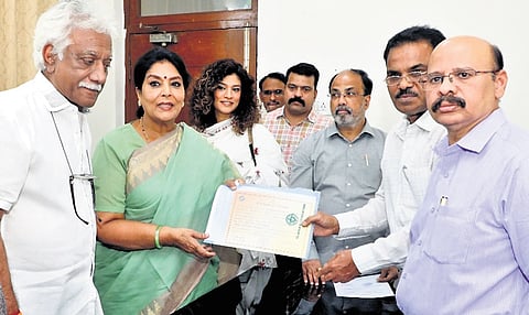 Newly elected Rajya Sabha member Renuka Chowdhury receives her election certificate from the Returning Officer on the Assembly premises on Wednesday