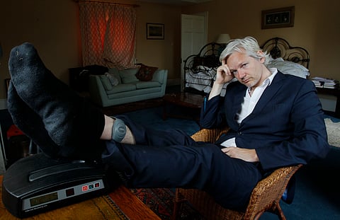 WikiLeaks founder Julian Assange is seen with his ankle security tag at the house where he is required to stay, near Bungay, England, June 15, 2011. 