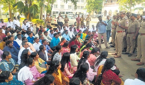 Managing director of MLM along with investors staging in a protest| Express