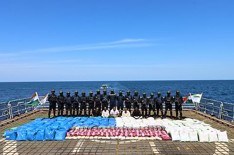 Indian Navy personnel show 3300Kgs contraband (3089kg Charas, 158kg Methamphetamine, 25kg Morphine) seized from a vessel in a joint operation with Narcotics Control Bureau.